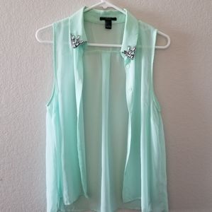 Mint green collared shirt